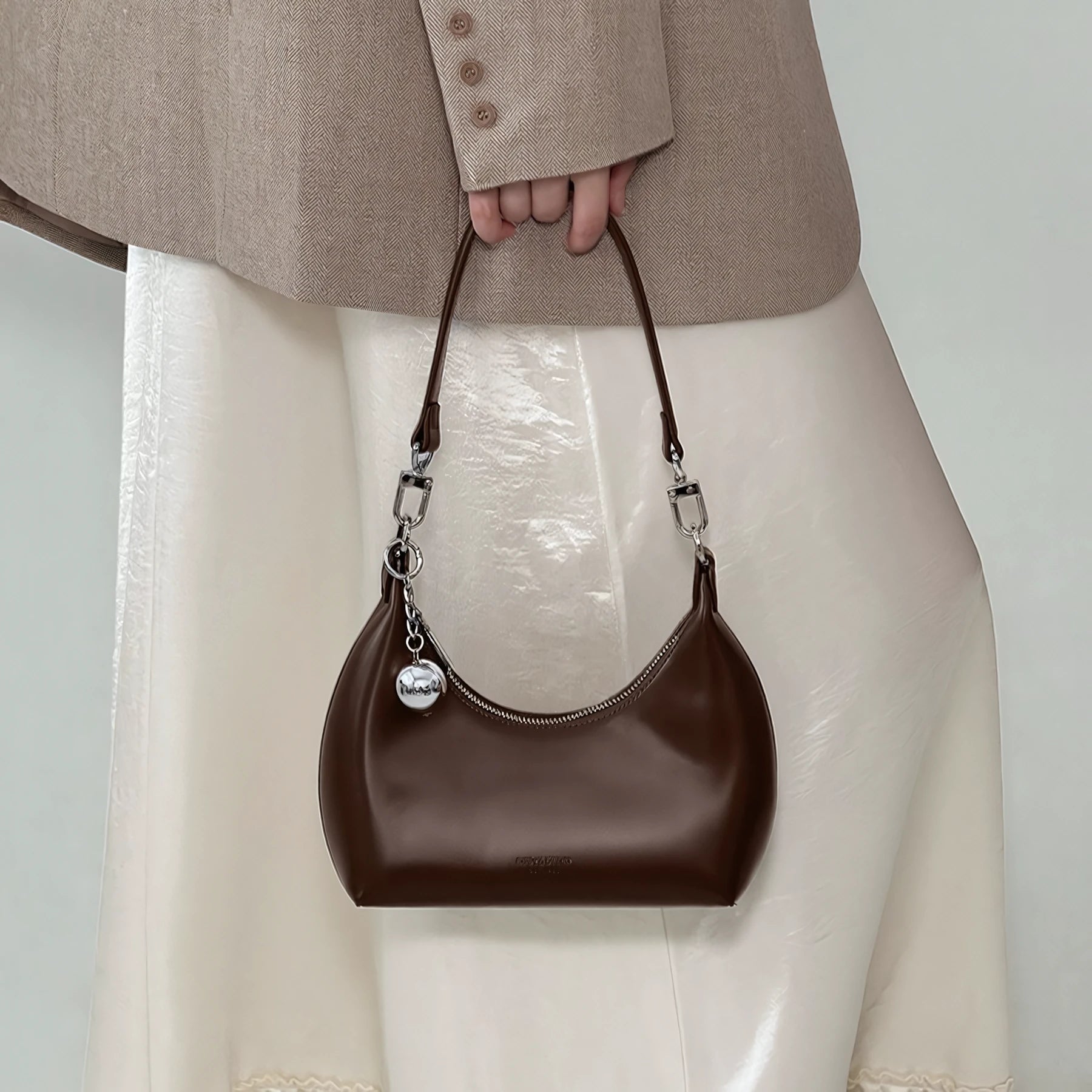 Moon Wink – Glossy Crescent Shoulder Bag