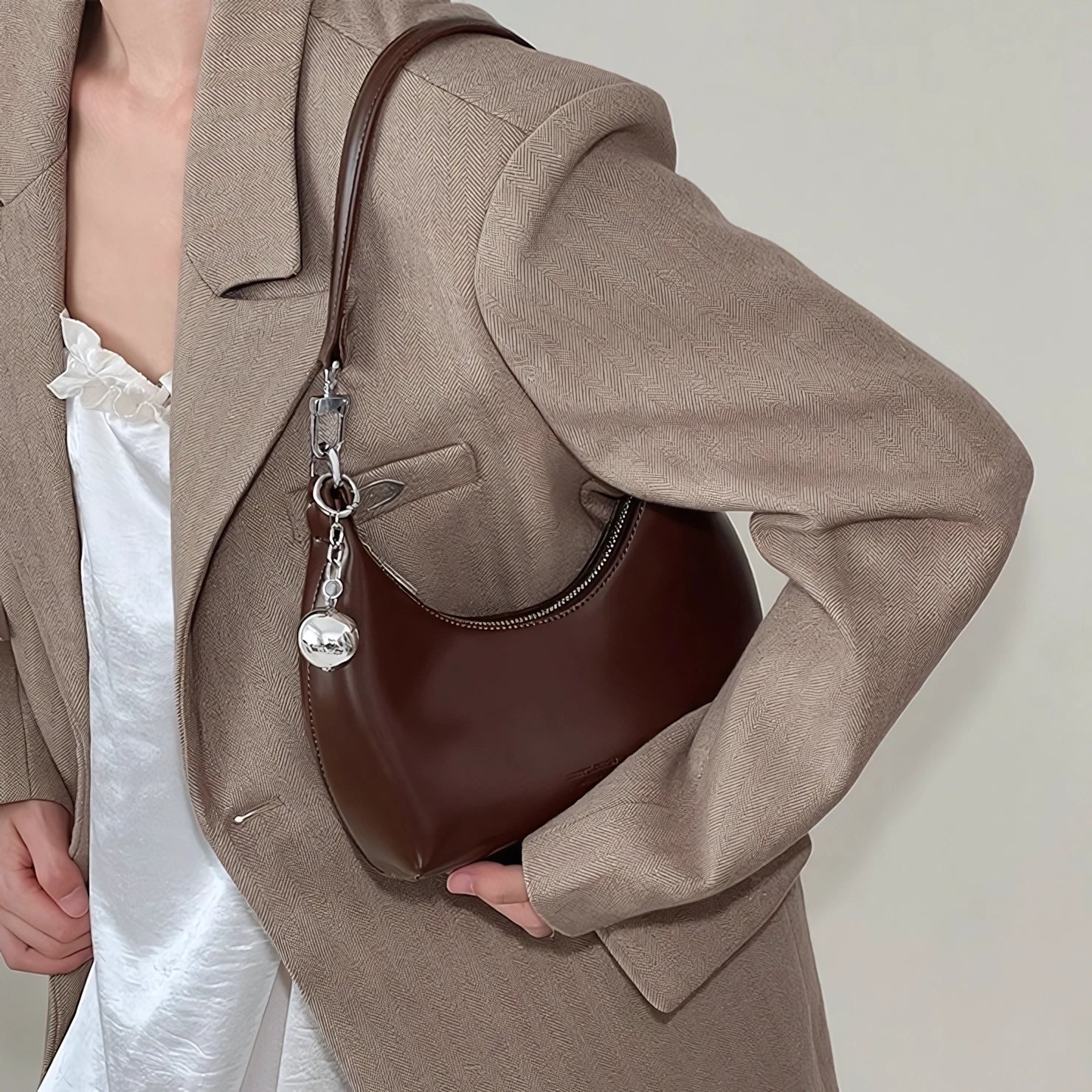 Moon Wink – Glossy Crescent Shoulder Bag