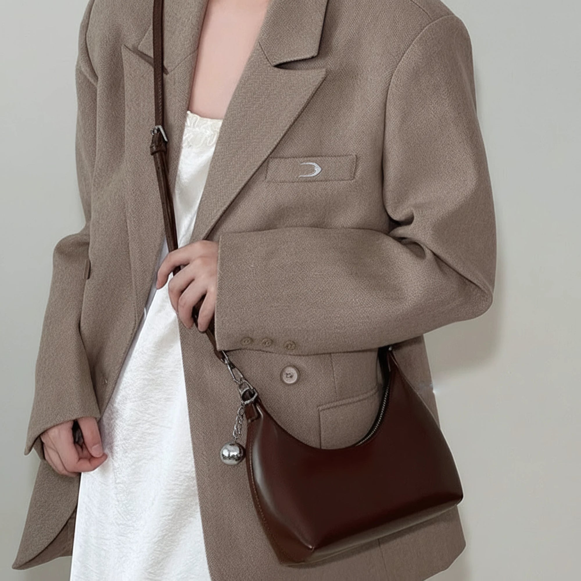 Moon Wink – Glossy Crescent Shoulder Bag
