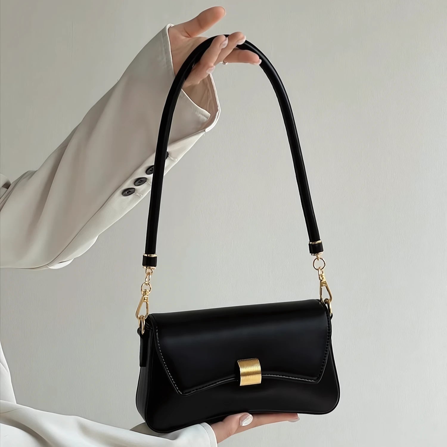 Golden Ripple – Wave-Edge Baguette Bag