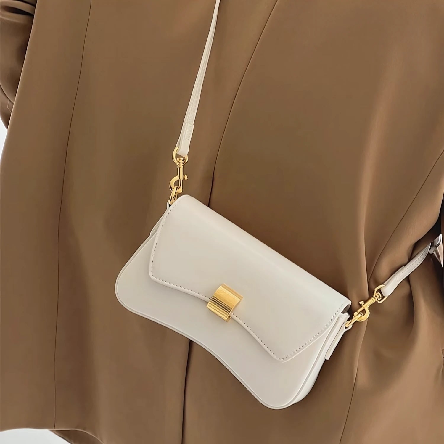 Golden Ripple – Wave-Edge Baguette Bag