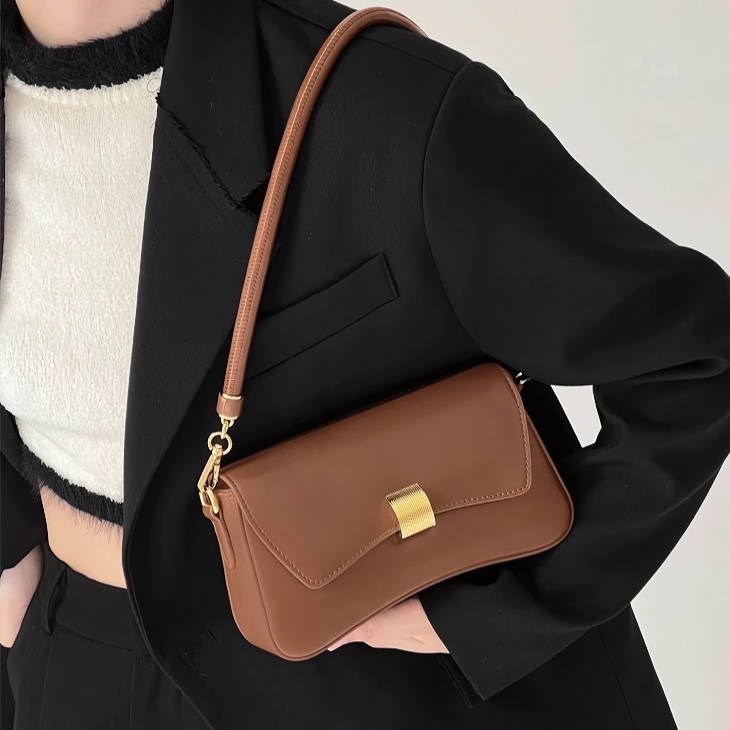 Golden Ripple – Wave-Edge Baguette Bag