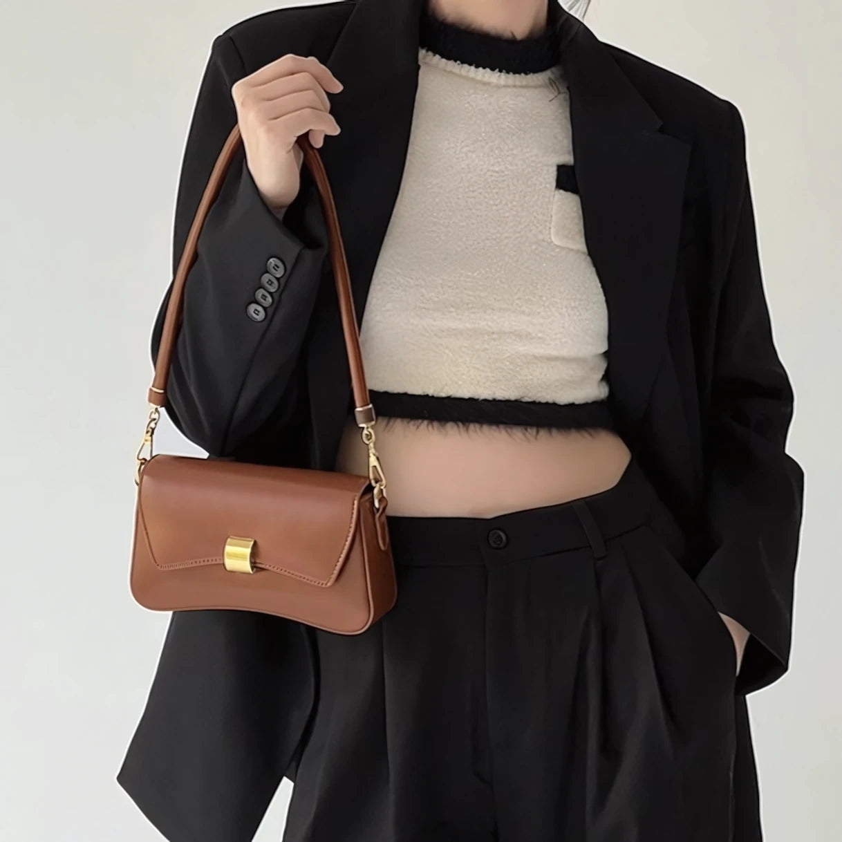 Golden Ripple – Wave-Edge Baguette Bag
