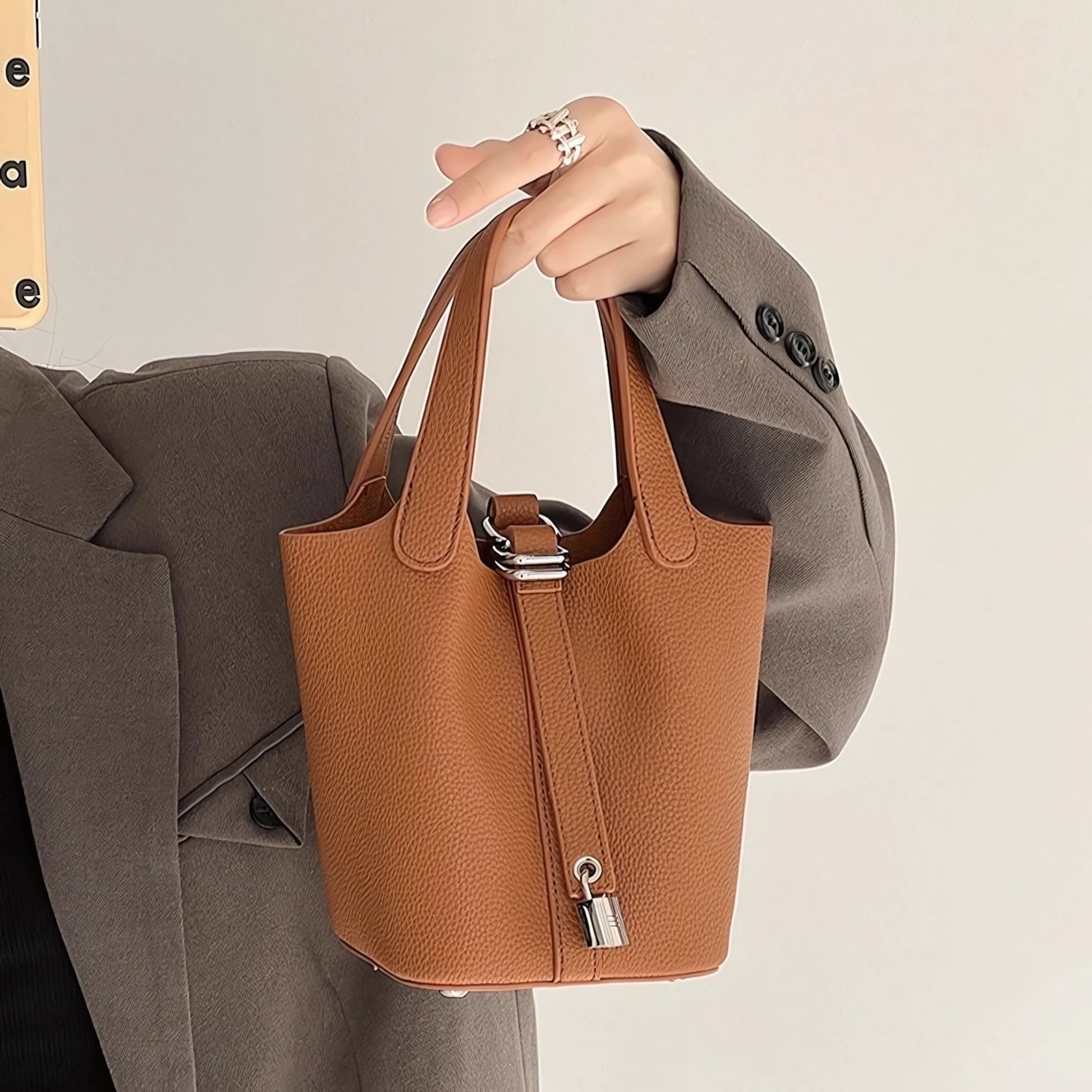 Soft Power in a Handle - Luxe Litchi Bucket Bag